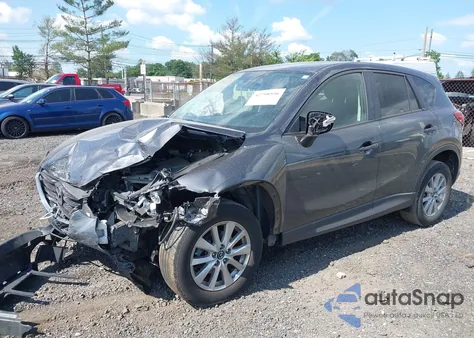2016 Mazda Cx-5 Touring z USA, uszkodzony, nr VIN JM3KE4CY2G0650145